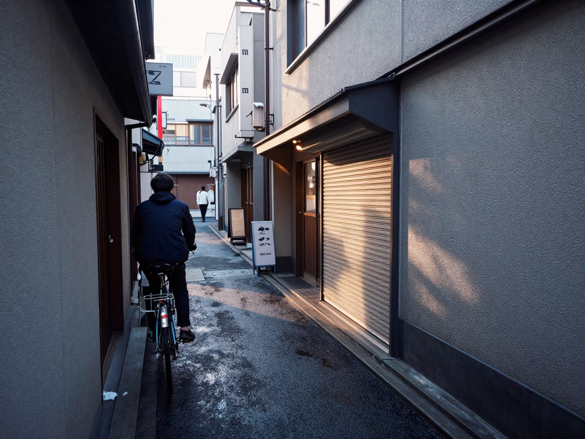 Cyclist Pausing in Osaka in in Osaka, Japan