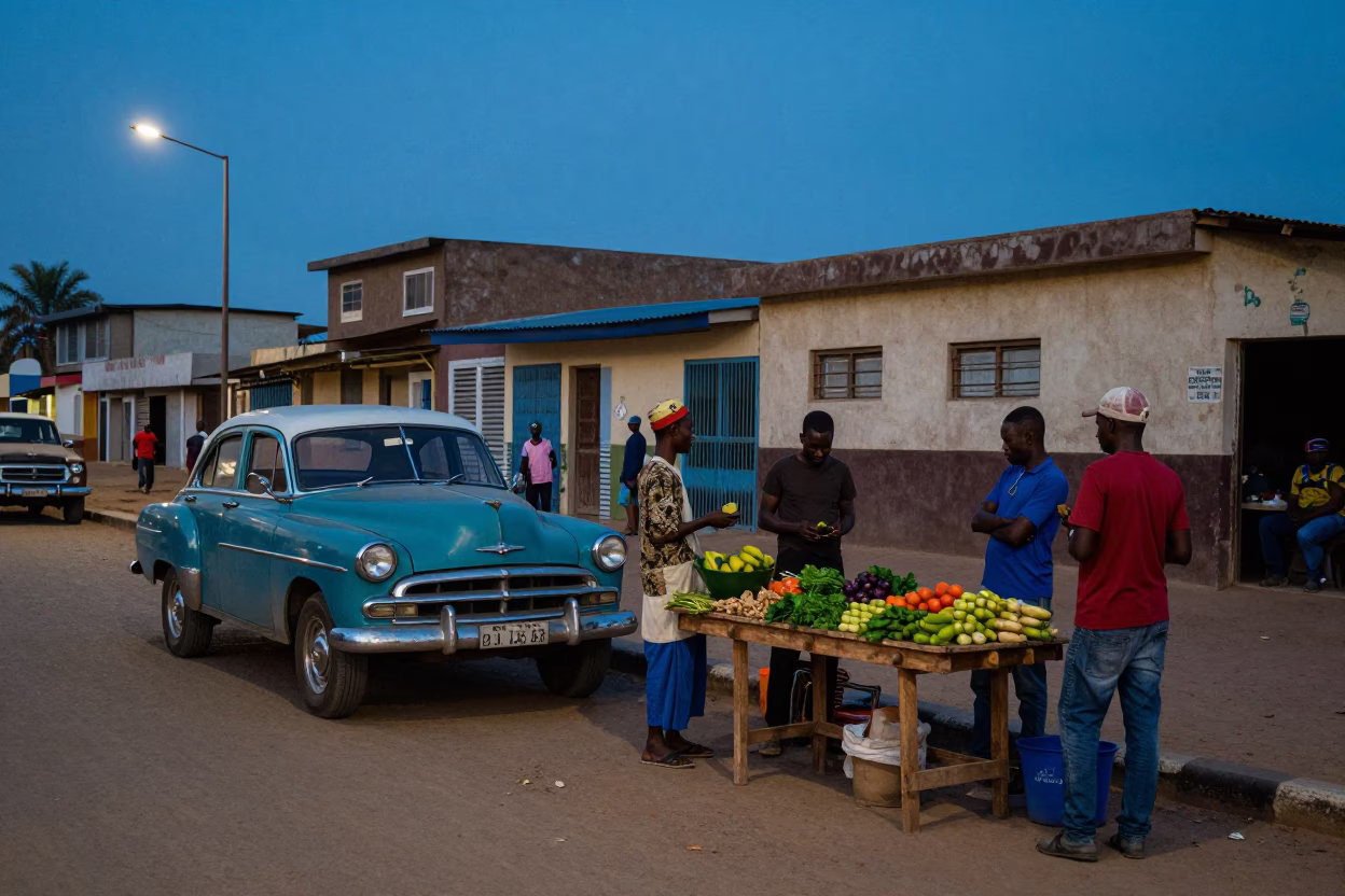 Dakar Senegal Blue Hour Street Scene with Vintage 1970s Automobile and Local Market Activity in in Dakar, Senegal