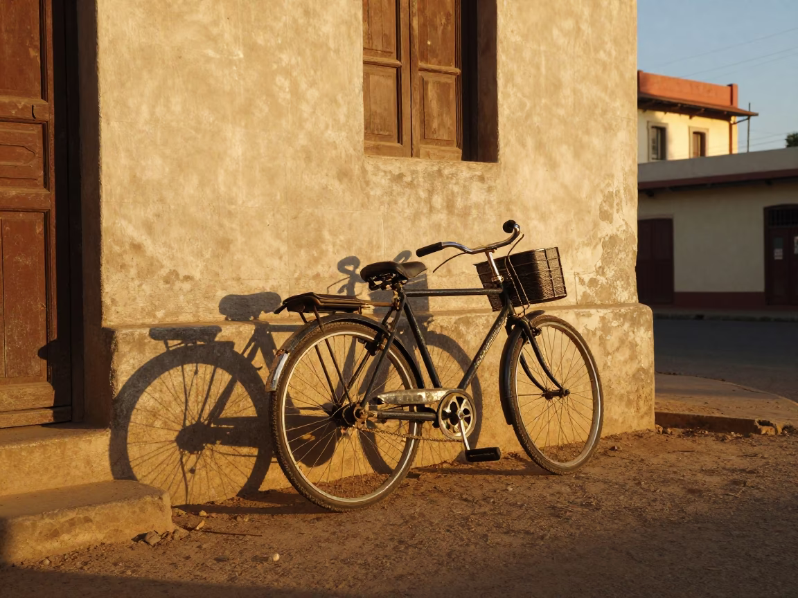 Dakar Senegal Golden Hour Street Scene with Vintage Bicycle and Colonial Architecture in in Dakar, Senegal