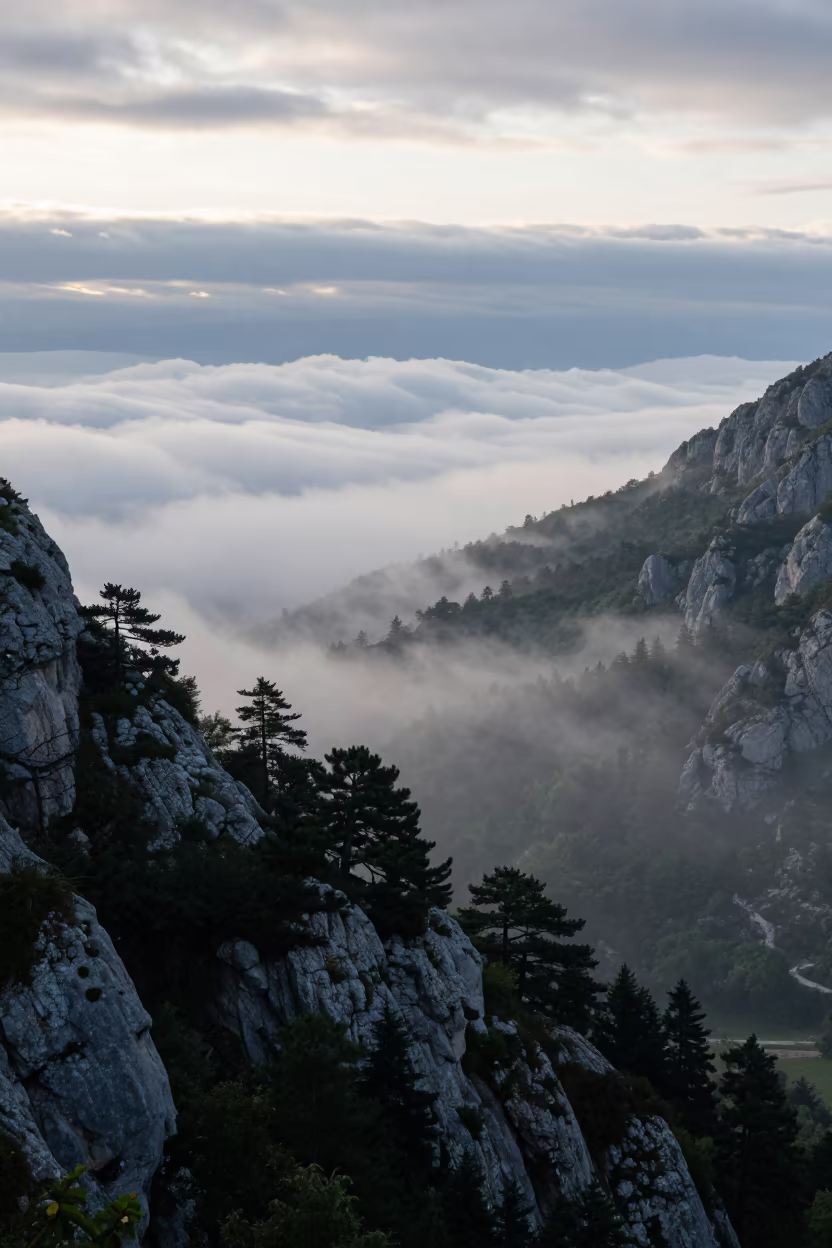 Dalmatian Valley Fog Sea at Dawn in beneath fast-moving cloud bands in Dalmatia