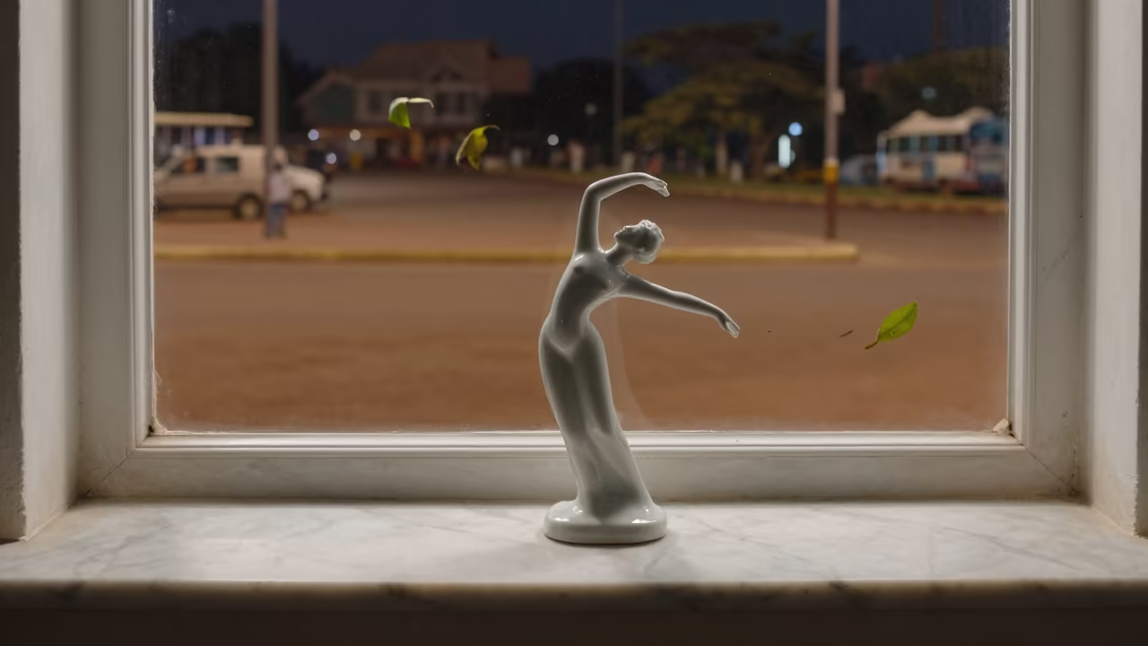 Dancer Figurine on Mantel at Mbuji-Mayi Midnight in at a public square in Mbuji-Mayi