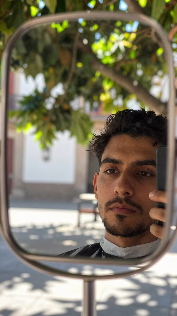 Dappled Light Reflection in Tenerife Barbershop Mirror in at a public square in San Cristóbal de La Laguna