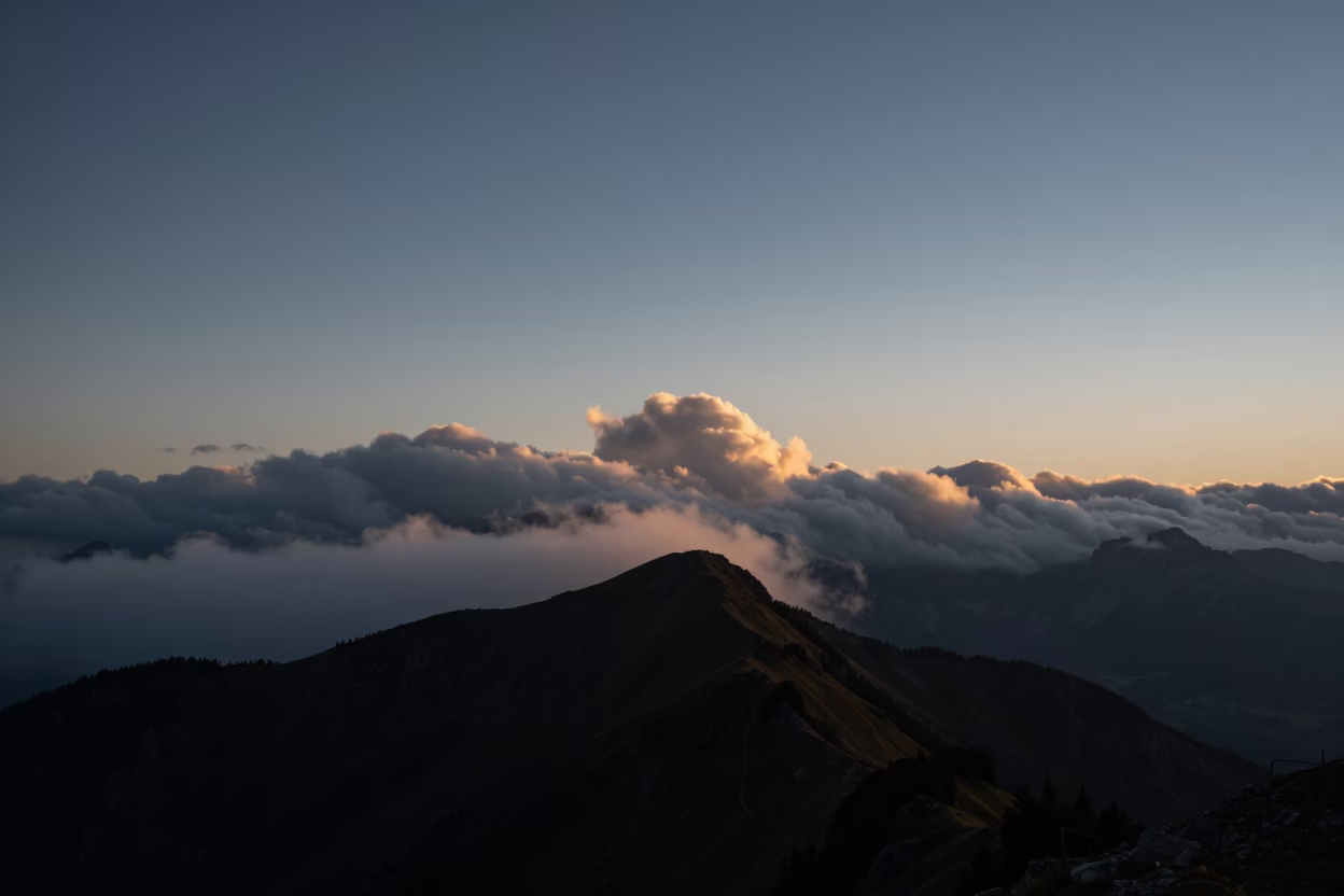 Dawn Breaking Over Austrian Thunderheads in over a horizon of stacked thunderheads in Austria