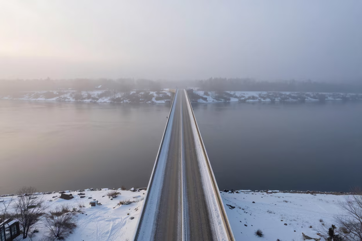 Dawn Bridge Over River in Minnesota Winter in beside a canal-front facade in Minnesota