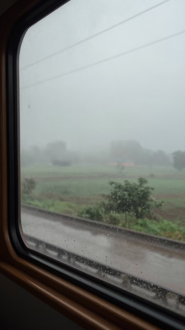 Dawn Fog Pressing Against Cabin Window Near Ikeja in beneath fast-moving cloud bands near Ikeja