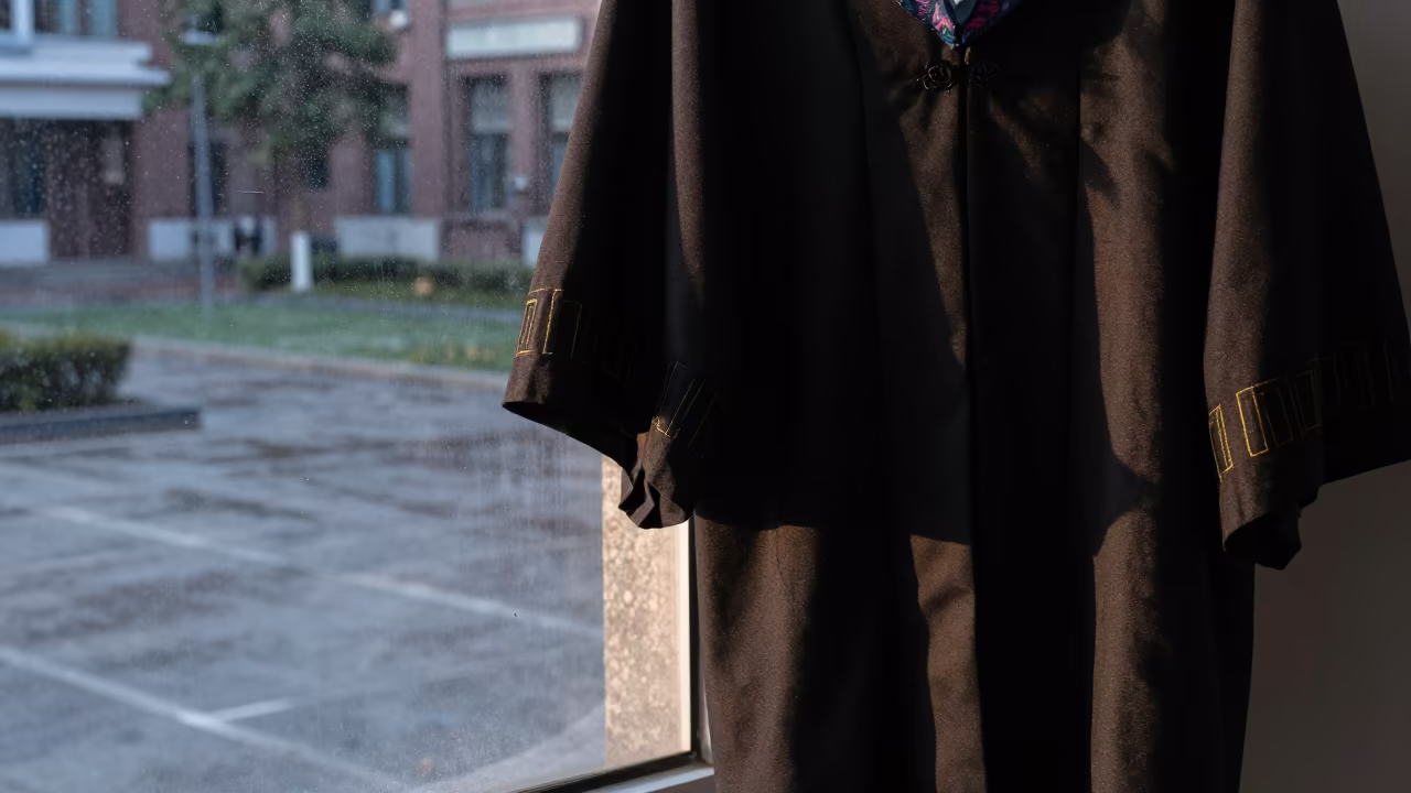 Dawn Graduation Gown Rim Light Tianjin Winter in across a rain-washed campus courtyard in Tianjin
