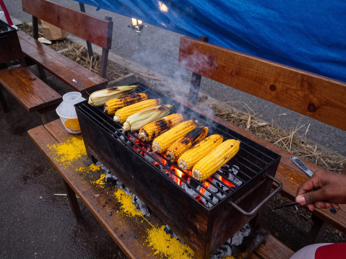 Dawn Grilling Corn on Market Bench in at a flower auction bench in Spanish Town