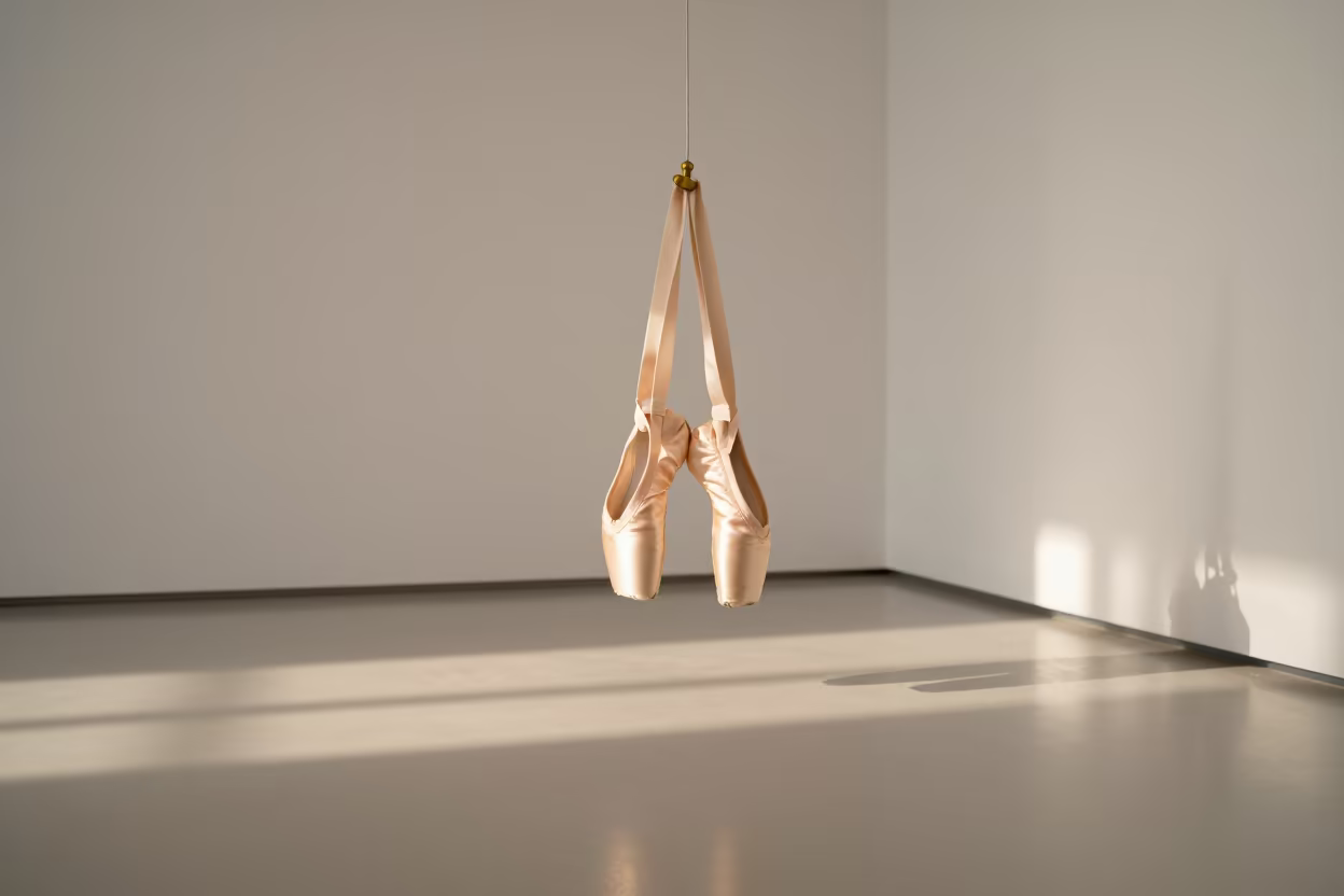 Dawn Light on Ballet Shoes in Sharjah Museum in on a museum plinth in Sharjah