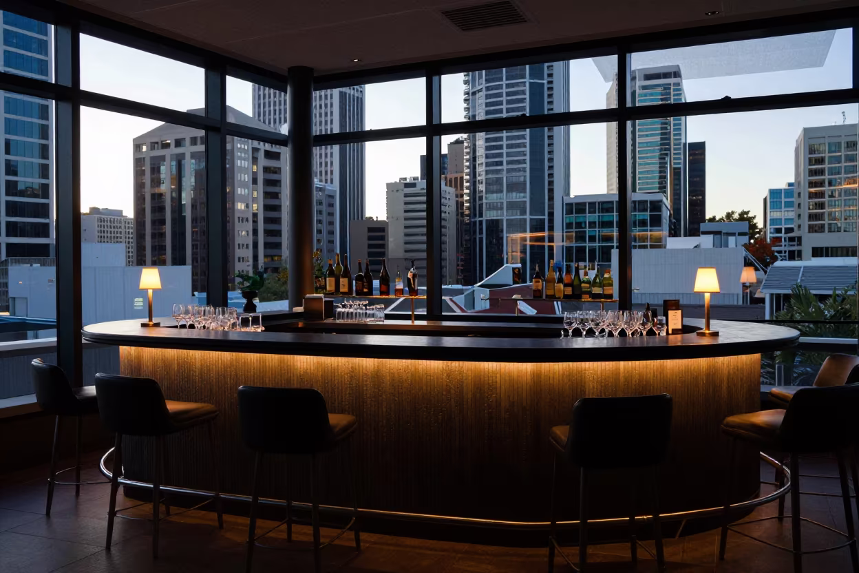 Dawn Light on Brisbane Rooftop Lounge Reception Desk in at a reception desk under warm light in Brisbane
