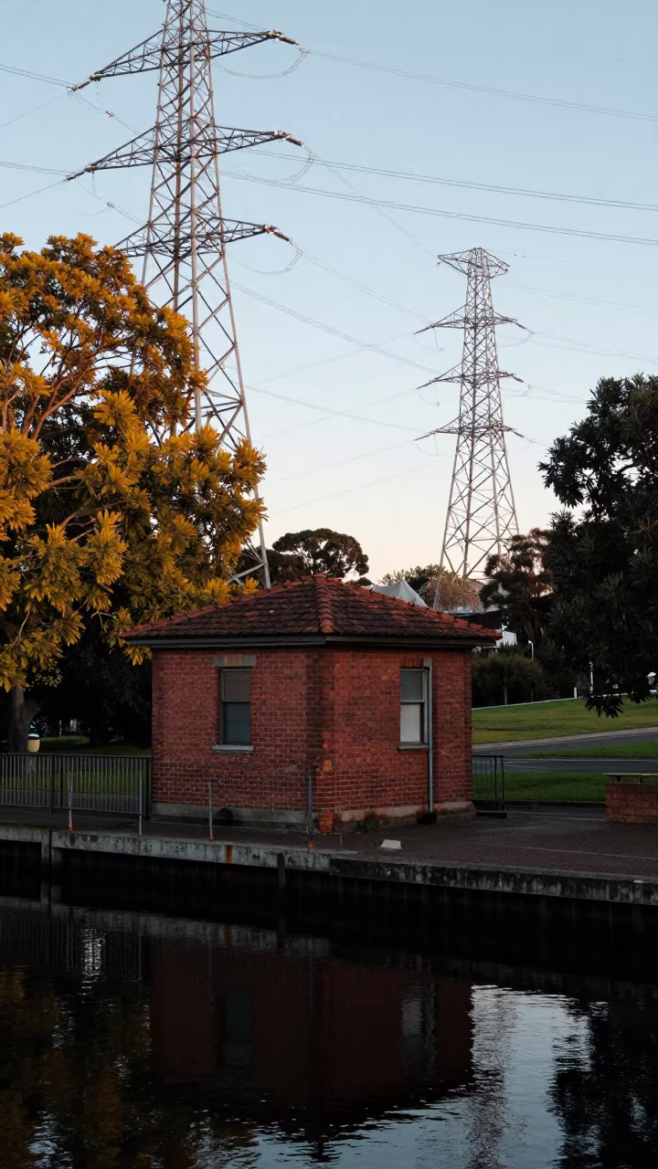 Dawn Light on Canal Lock Keeper Cabin Sydney in beneath transmission towers in Sydney