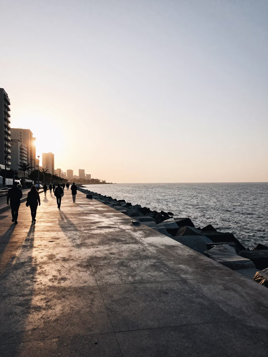 Dawn Light on Beirut Corniche Promenade with Pedestrians and Coastal Sea Views in in Beirut, Lebanon