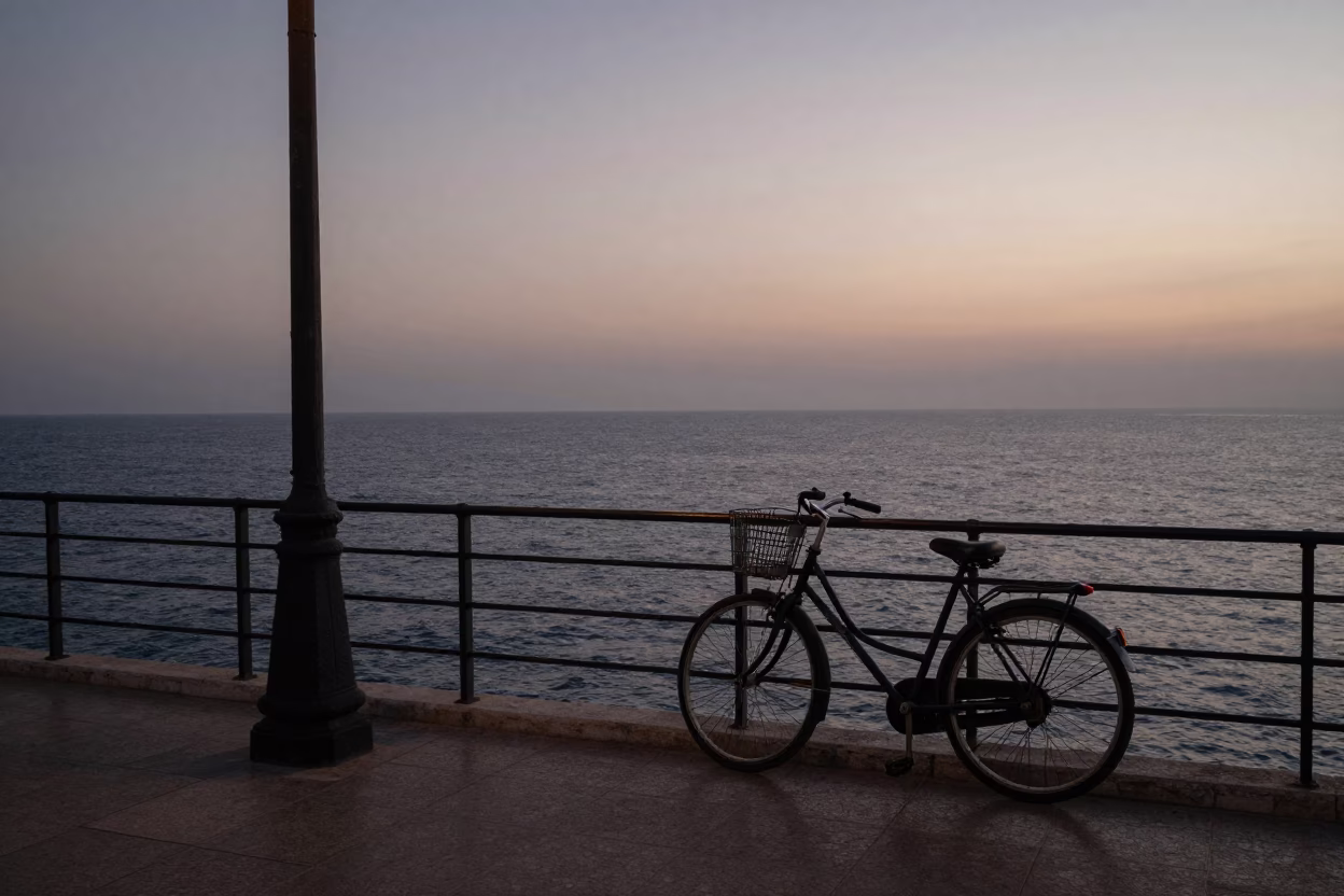 Dawn Light on Beirut Corniche Street Scene with Bicycle and Flowerpot in Early Morning in in Beirut, Lebanon