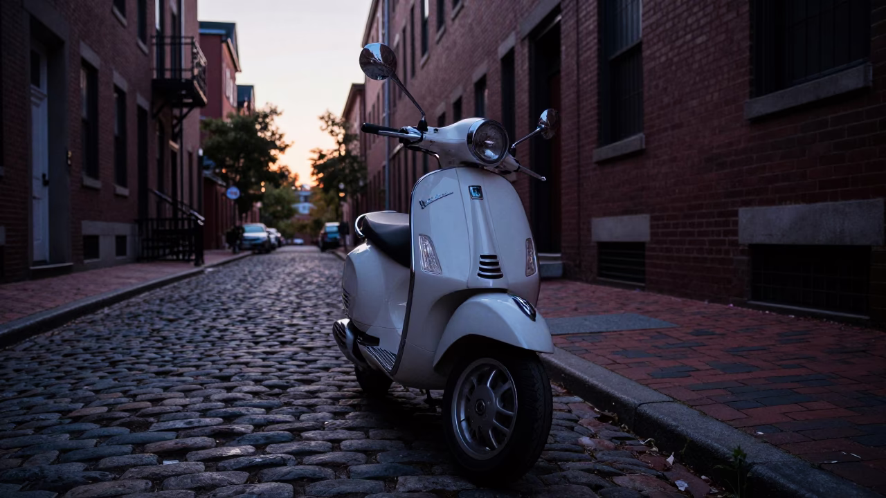 Dawn Light on Boston Cobblestones with Vintage Vespa and Urban Street Scene in in Boston, Massachusetts, United States