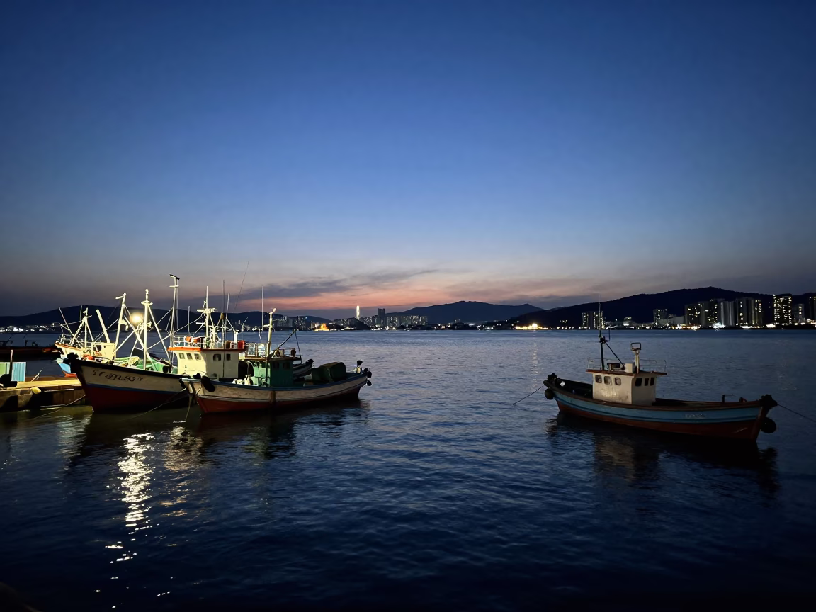 Dawn Light on Busan Harbor with Docked Fishing Boats and Coastal Infrastructure in in Busan, South Korea