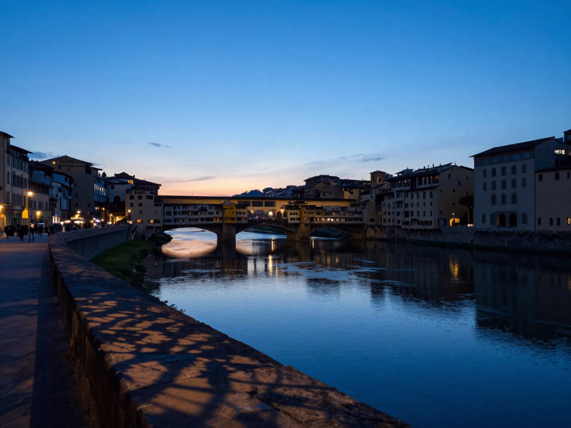 Dawn Light on Florence Arno Riverbank with Leaf Shadows and Quiet Urban Morning in in Florence, Italy