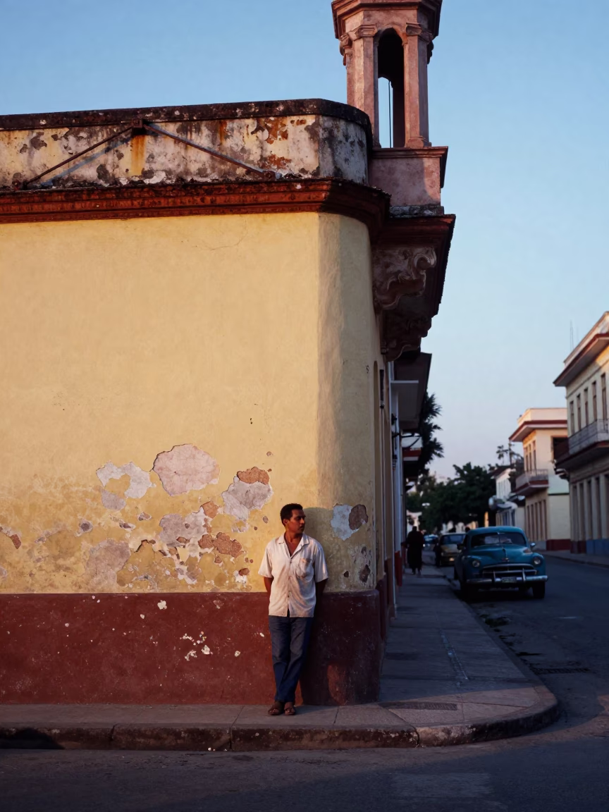 Dawn Light on Havana Street Corner with Rusty Rail and Painted Window Glass in in Havana, Cuba