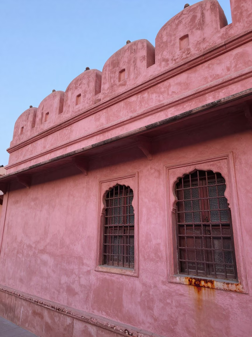 Dawn Light on Jaipur Pink City Facade with Rust Details and Morning Tea Stains in in Jaipur, India