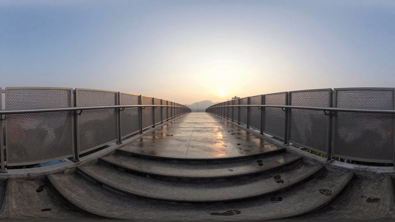 Dawn Light on Kuala Lumpur Pedestrian Overpass with Wet Footsteps and Perforated Metal Railings in in Kuala Lumpur, Malaysia