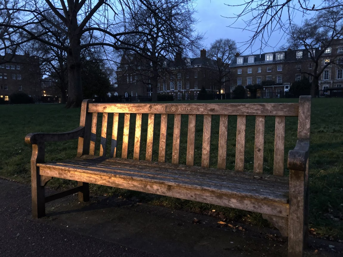 Dawn Light on London Park Bench with Faded Smudges and Early Morning Stillness in in London, United Kingdom