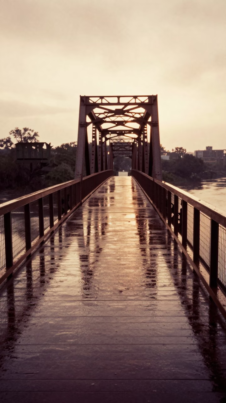 Dawn Light on Rain-Slicked Drawbridge Deck Reflecting River Waters in Austin Texas in in Austin, Texas, United States