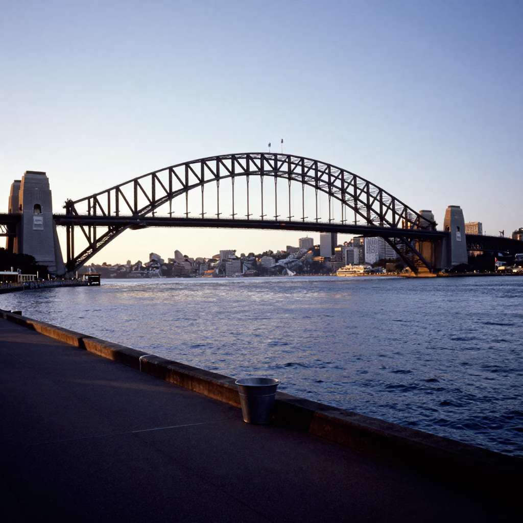 Dawn Light on Sydney Harbour Bridge and Ferry Wharf with Metal Bucket in in Sydney, New South Wales, Australia