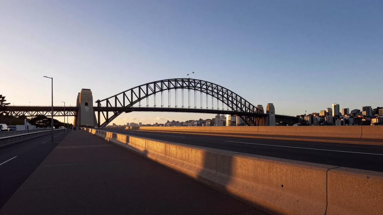 Dawn light on Sydney Harbour Bridge approach with vintage Italian majolica plate and orchid in in Sydney, New South Wales, Australia
