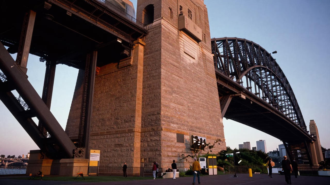 Dawn Light on Sydney Harbour Bridge Pylon with Commuter Cardigan and Tram Stop in in Sydney, New South Wales, Australia