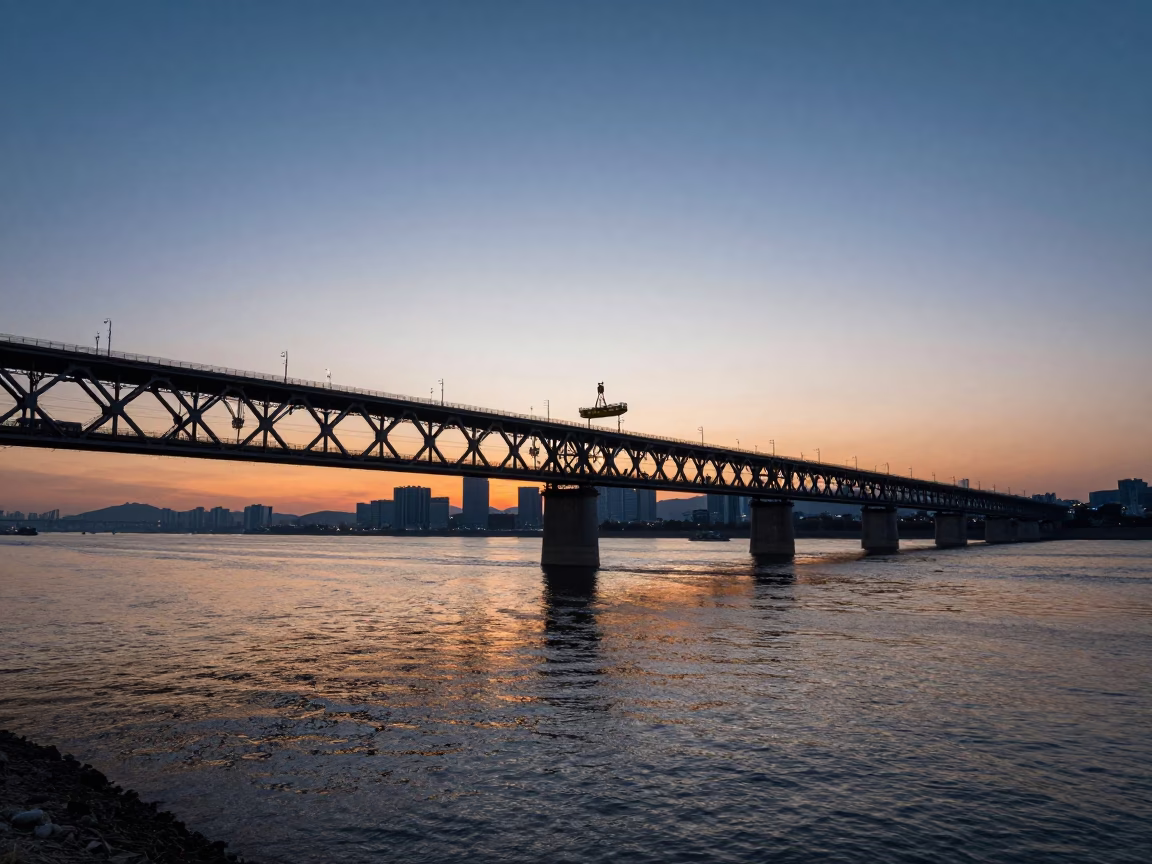 Dawn light reflecting on Han River bridge maintenance cradle in Seoul South Korea in in Seoul, South Korea