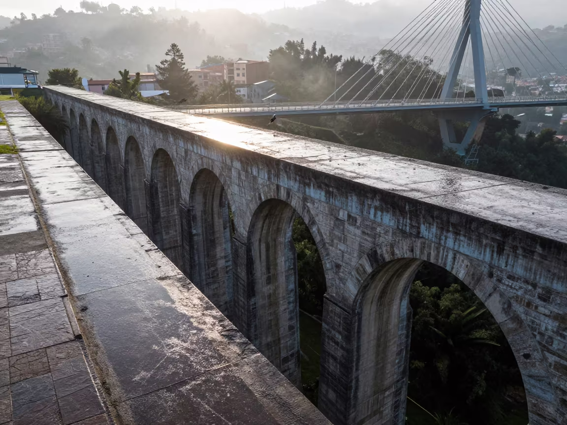 Dawn Light on Roman Aqueduct Near Bridge in under a cable-stayed bridge span near Parque Berrio, Medellin