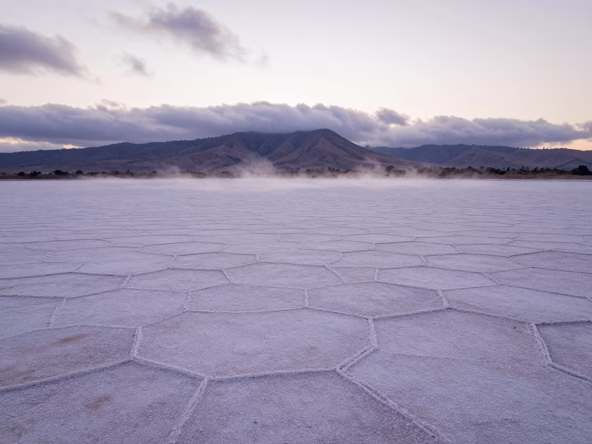 Dawn Mist Over Hexagonal Salt Crystals Mauritius in from a ridge above layered foothills in Mauritius