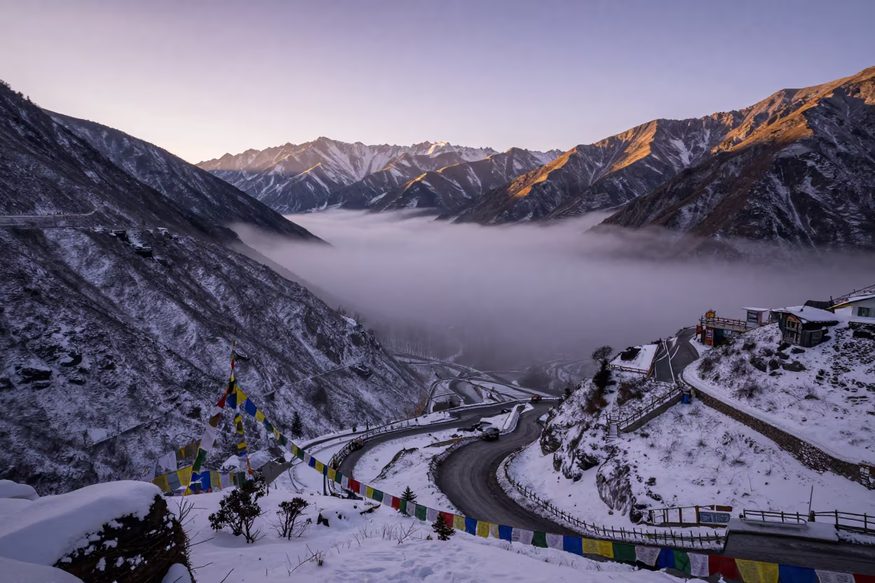 Dawn Mist Over Snowy Pass Near Shimla in along a high mountain pass beneath prayer flags near Shimla