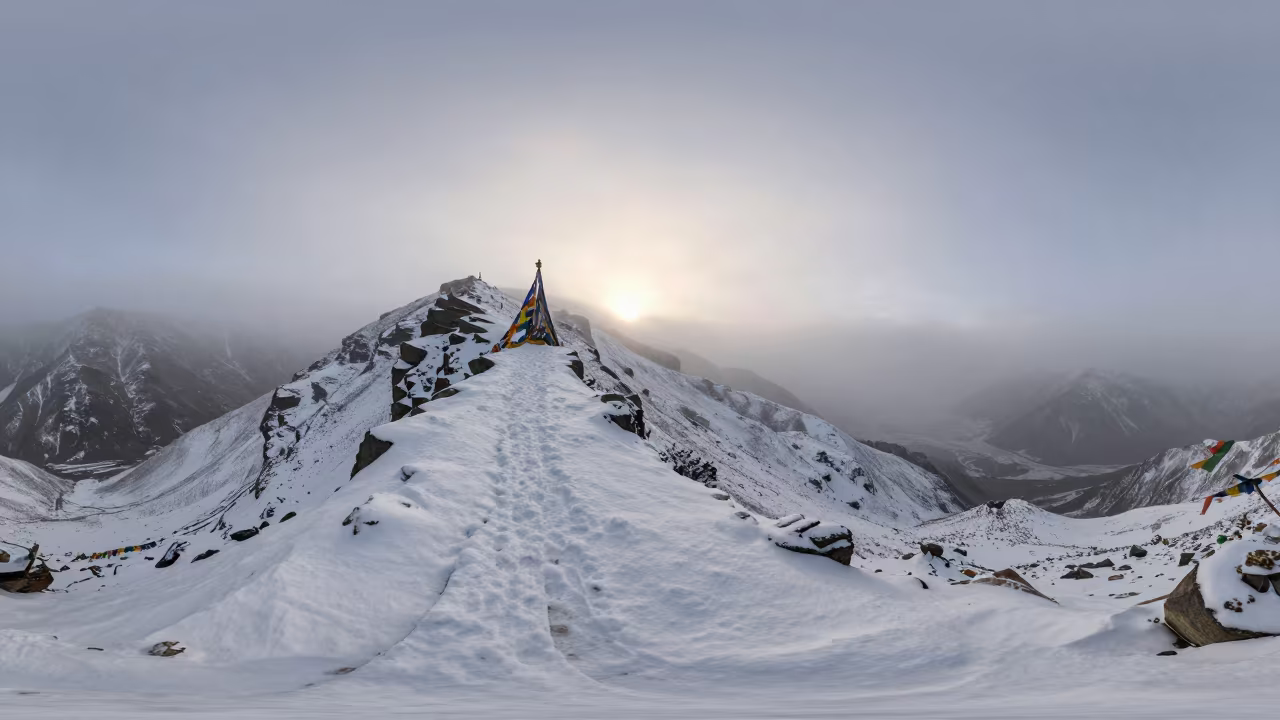 Dawn Mist on Wind-Cut Ridge Near Leh in on a wind-cut ridge below prayer flag lines near Leh