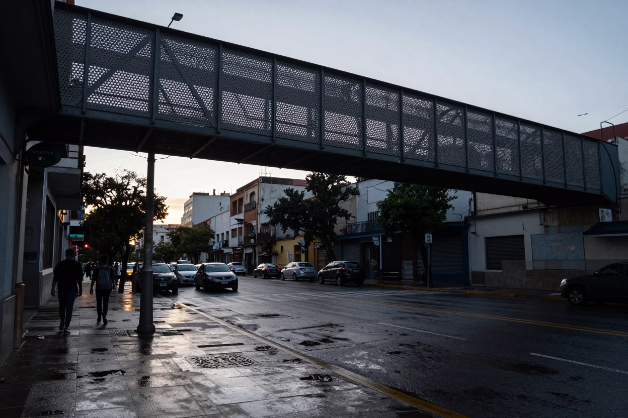 Dawn Street Scene in Buenos Aires Argentina with Wet Footsteps and Perforated Metal Overpass in in Buenos Aires, Argentina
