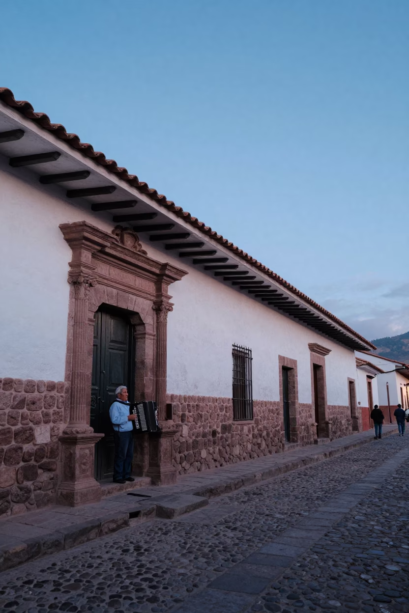 Dawn Street Scene in Cusco Peru With Accordion Player and Colonial Architecture in in Cusco, Peru