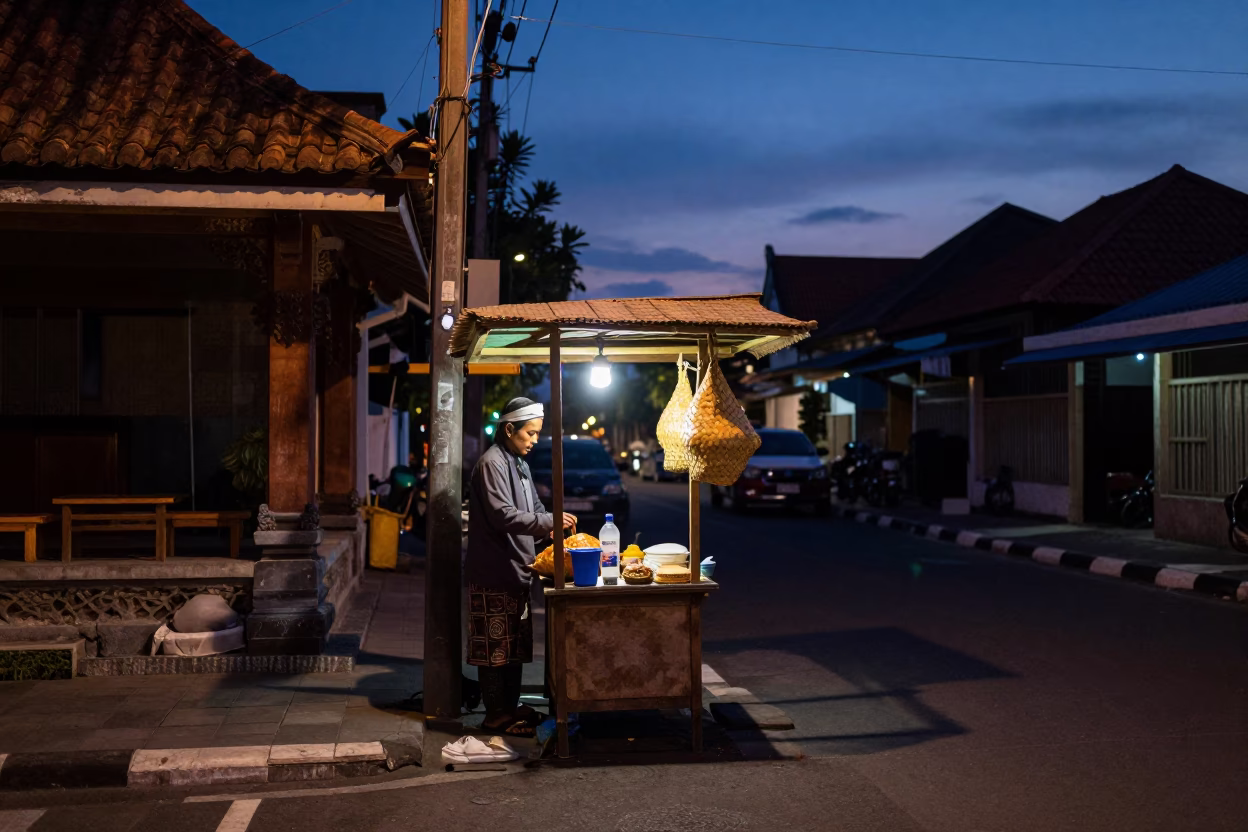 Dawn street scene in Denpasar Indonesia with local vendor and woven basket in in Denpasar, Indonesia