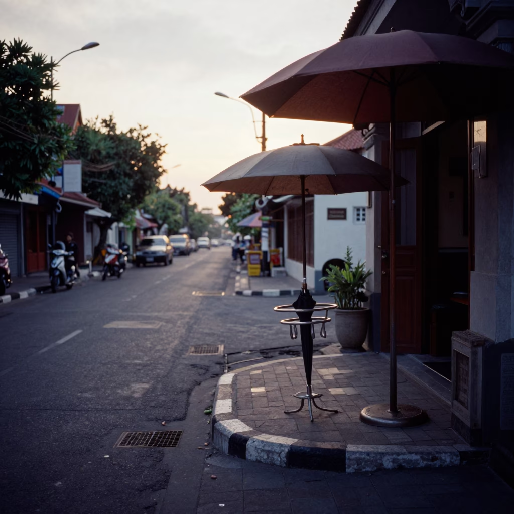 Dawn Street Scene in Denpasar Indonesia with Umbrella Stand and Local Morning Activity in in Denpasar, Indonesia
