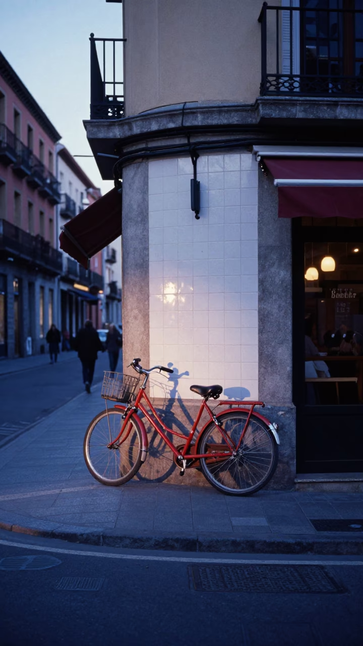 Dawn Street Scene in Madrid Spain with Bicycle Leaning Against Cafe and Morning Light in in Madrid, Spain