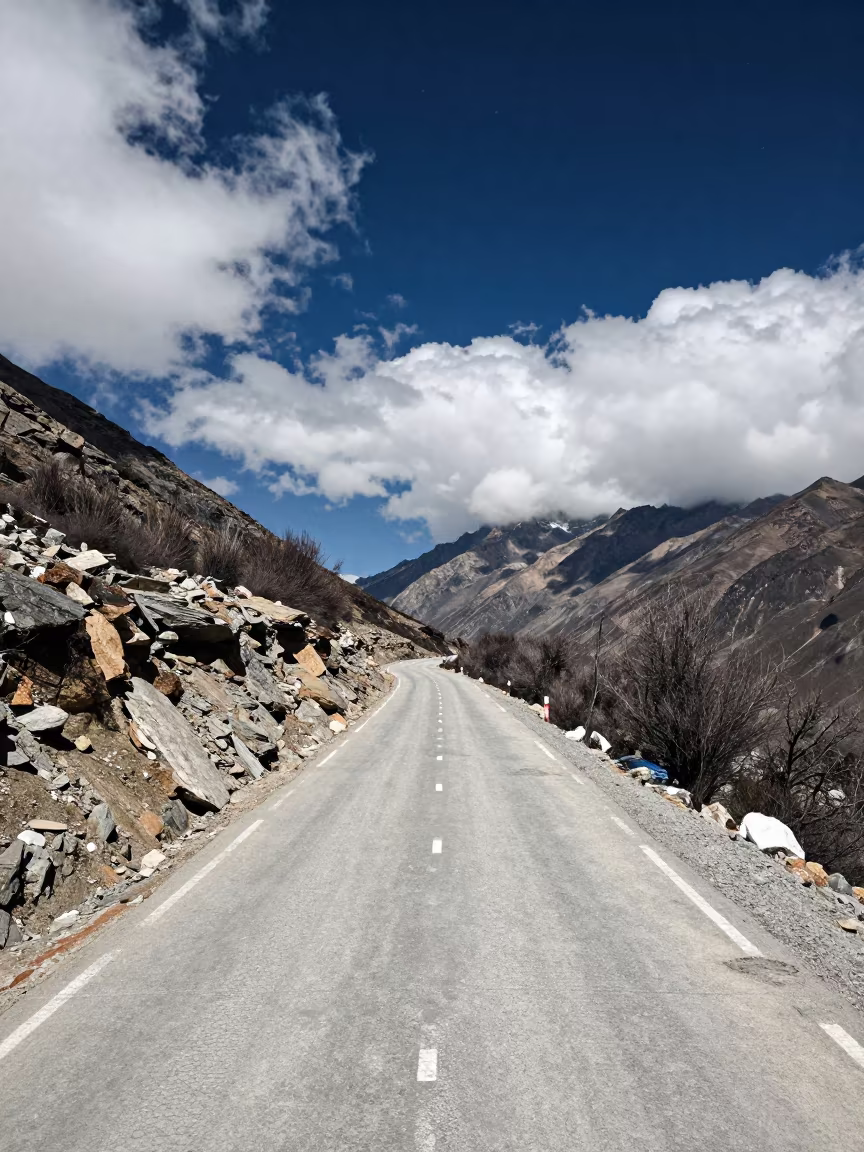 Day to Night Mountain Pass with Light Trails in at a rocky saddle overlooking a mountain valley near Kathmandu