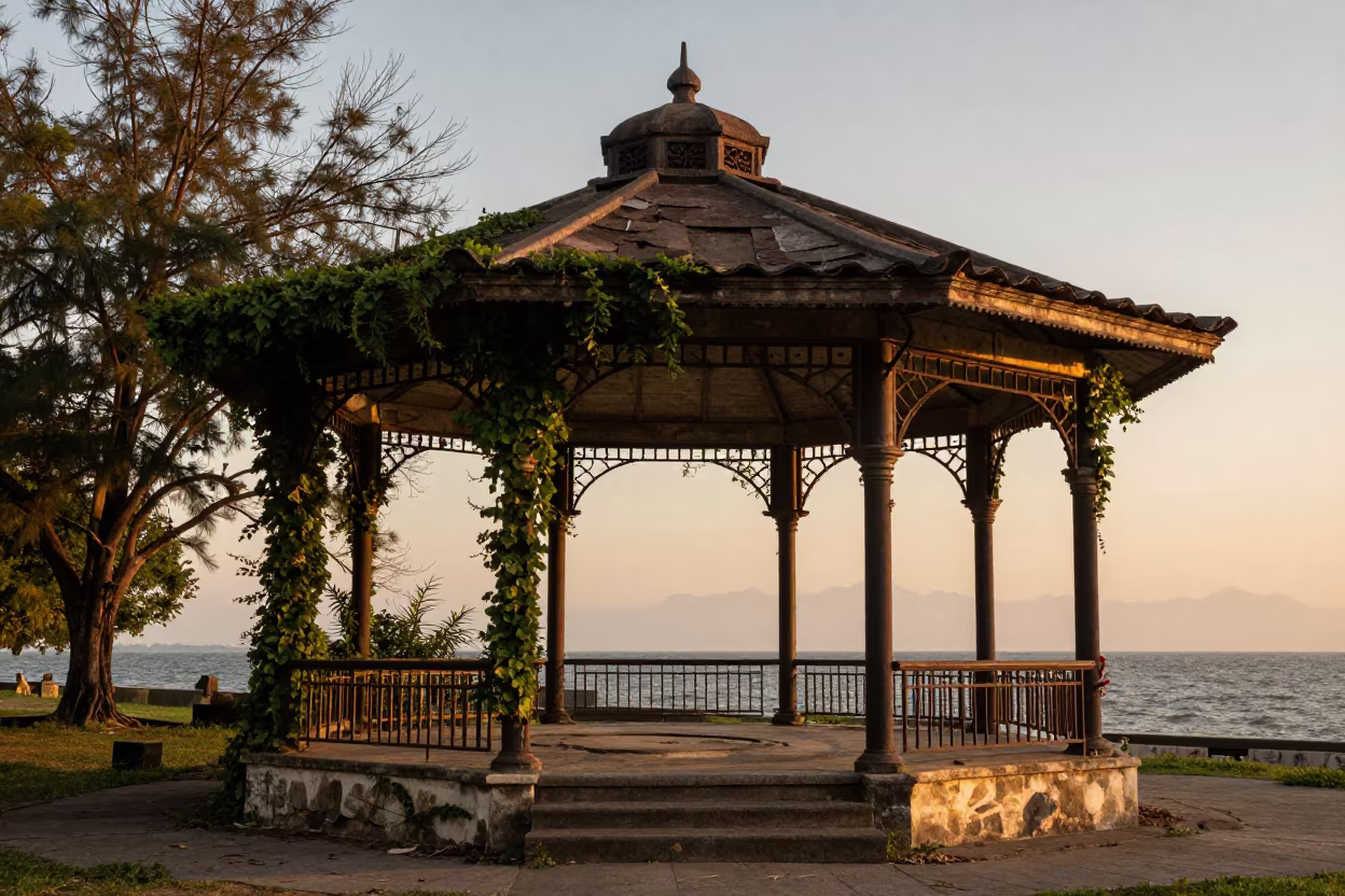 Decaying Seaside Bandstand with Wrought Iron in beside ivy-draped masonry near Quezon City