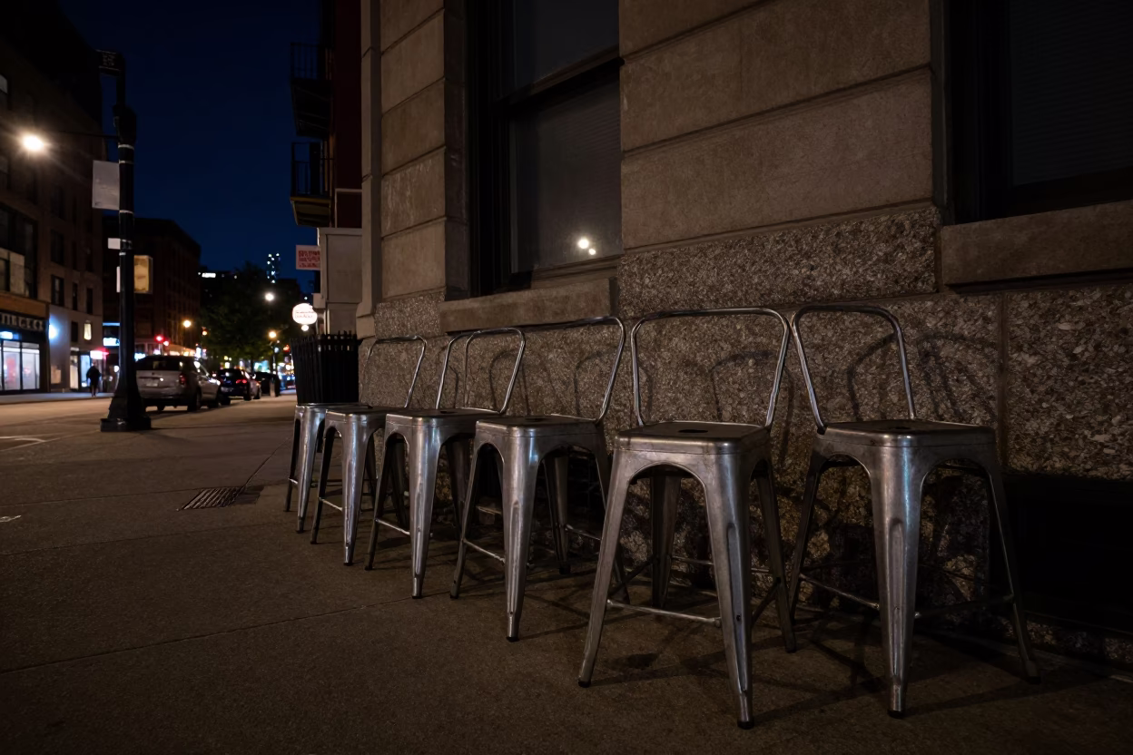 Deep Night Chicago Street Scene with Metal Stools and Urban Architecture in in Chicago, Illinois, United States