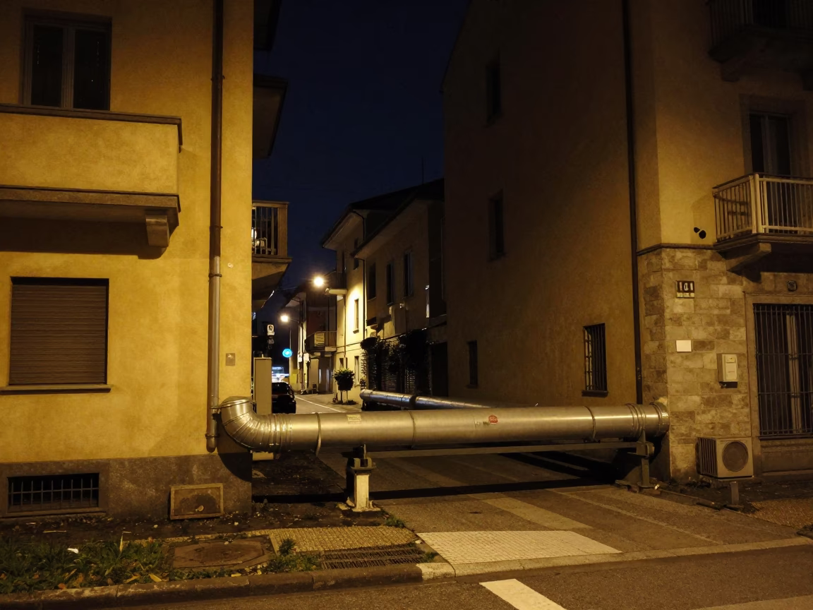 Deep Night Milan Street Scene with District Heating Pipes and Apartment Blocks in in Milan, Italy