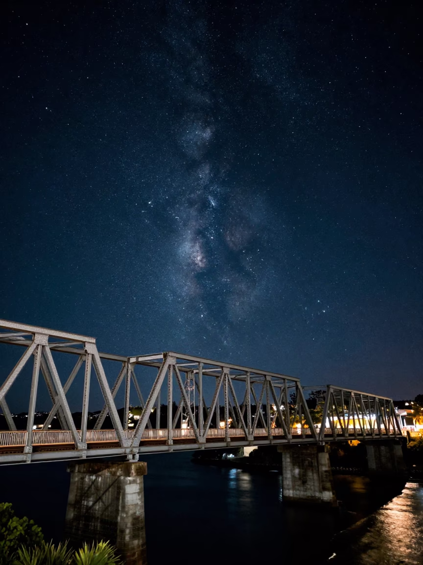 Deep Night Sky Over Auckland New Zealand Iron Bridge Train Crossing in in Auckland, New Zealand