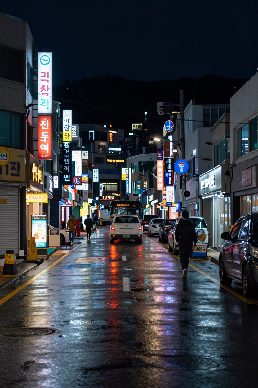 Deep Night Street Scene in Busan South Korea with Neon Reflections and Urban Architecture in in Busan, South Korea