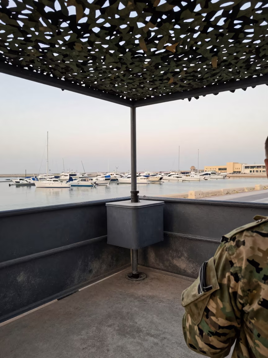 Deicer Wand Nozzle Box Under Camo Net Dubai in beneath a camouflage net shelter in Marina, Dubai