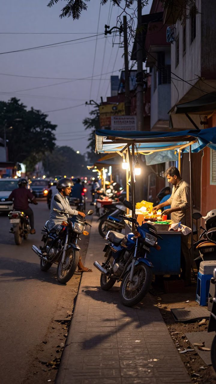 Delhi India Twilight Street Scene with Motorcycle and Local Vendors in in Delhi, India