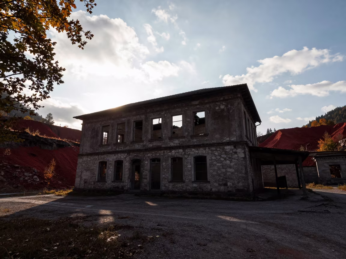 Derelict Quarry Office Silhouetted Against Autumn Light in through an abandoned ceremonial court in Tyrol