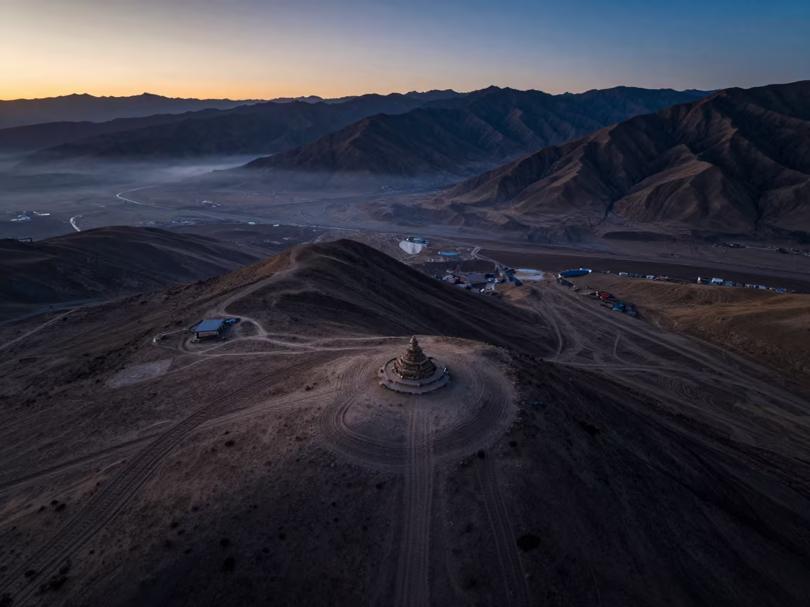Desert Tracks Above Leh Summit Cairn Twilight in beside a summit cairn above the tree line near Leh