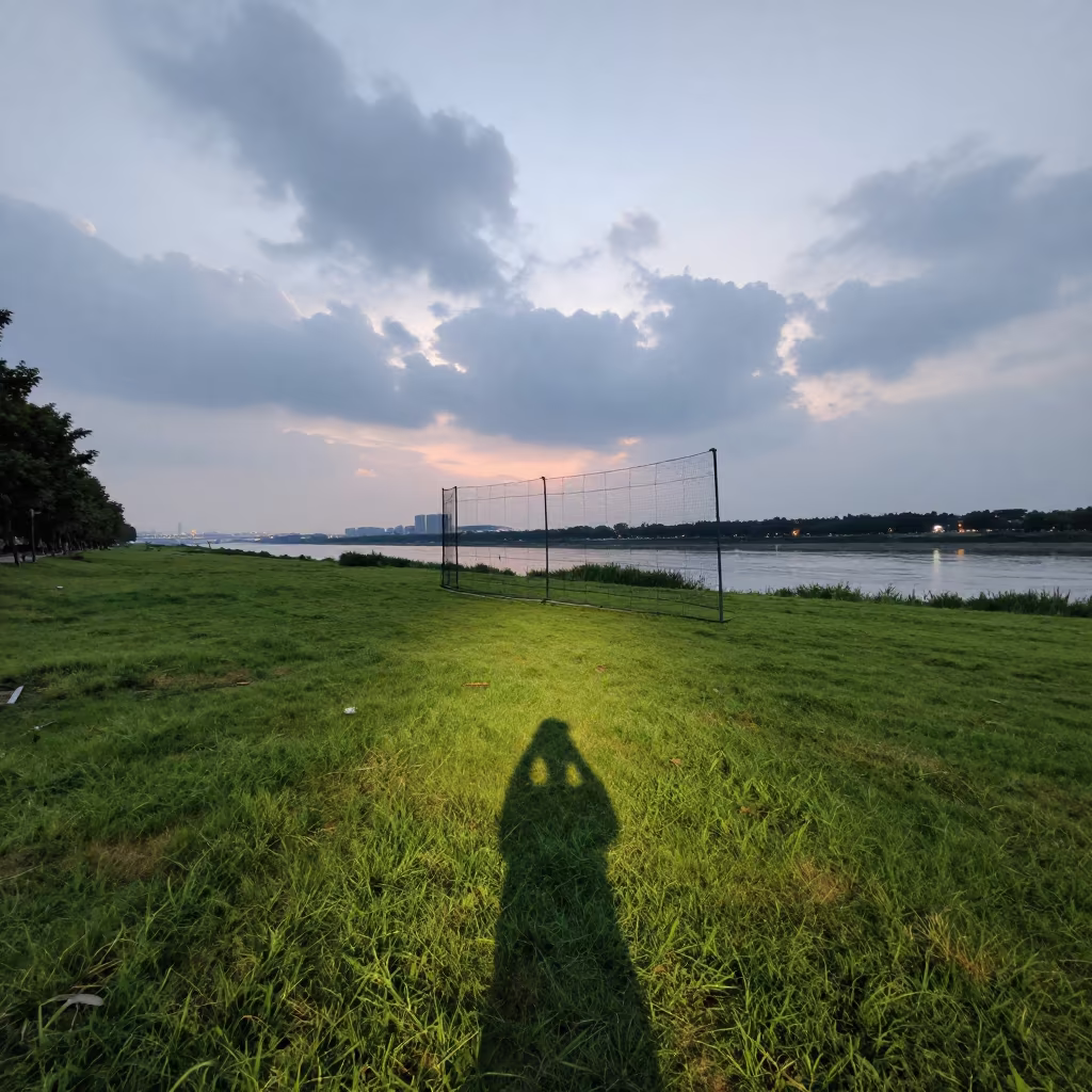 Discus Cage Shadow on Hefei Riverbank Grass in by a riverbank near Hefei