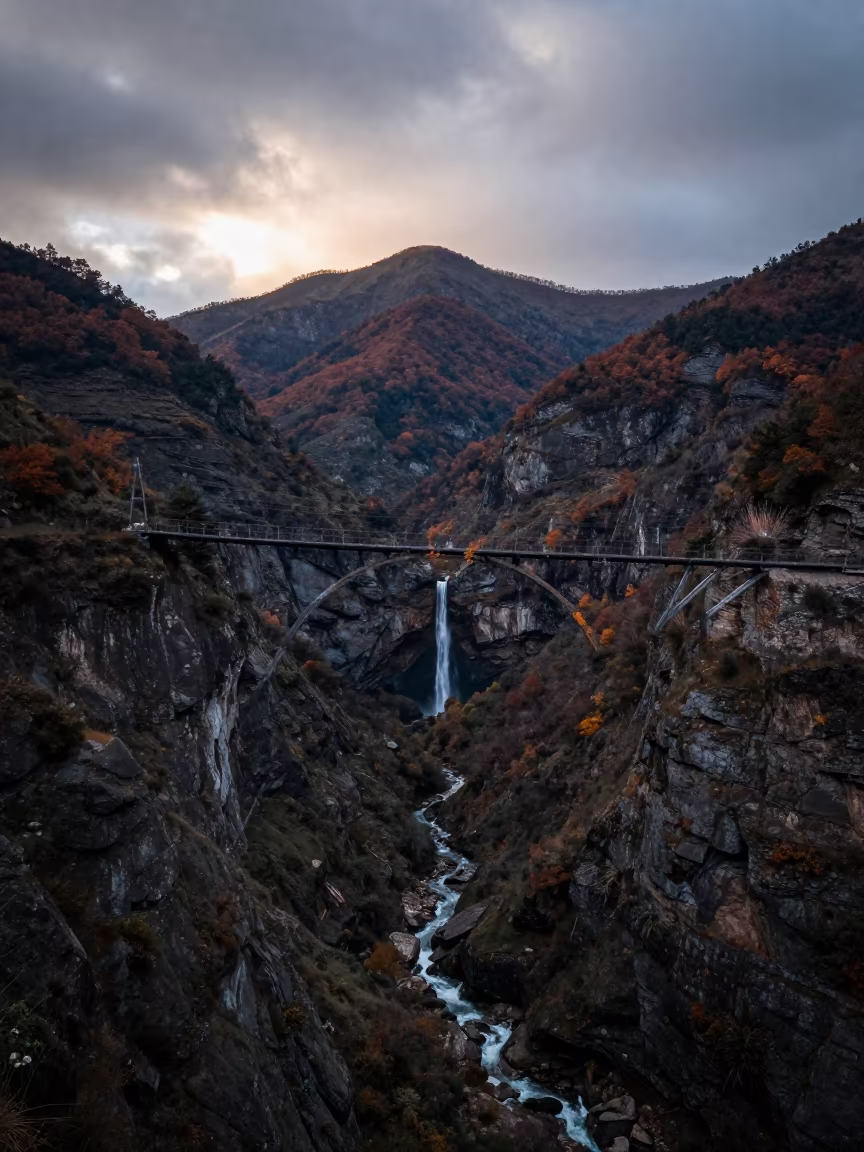 Distant Waterfall in Hanging Valley La Paz in from a ridge above layered foothills near Calle Jaen, La Paz