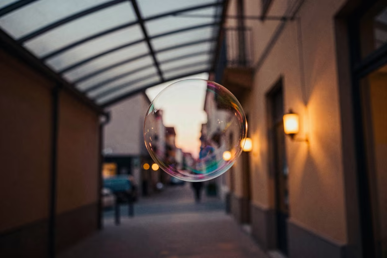 Distorted Cityscape Reflected in Soap Bubble in inside a glass-roofed arcade in Cúa